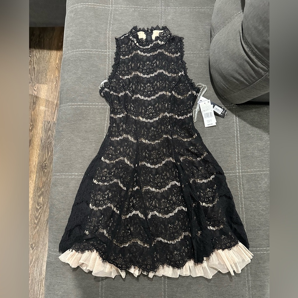 Black lace dress tan under lay never worn, still has tags